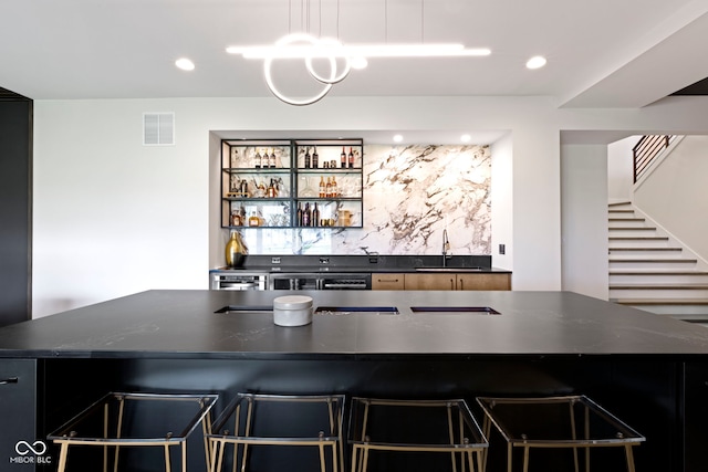 1333 Chatham Rdg Ct, Westfield, IN 46074 - bar featuring visible vents, stairway, recessed lighting, a sink, and bar area