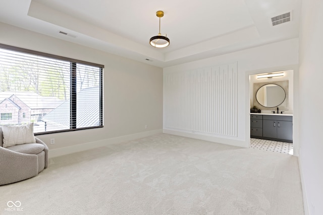 1333 Chatham Rdg Ct, Westfield, IN 46074 - unfurnished room featuring visible vents, a sink, a raised ceiling, and light colored carpet
