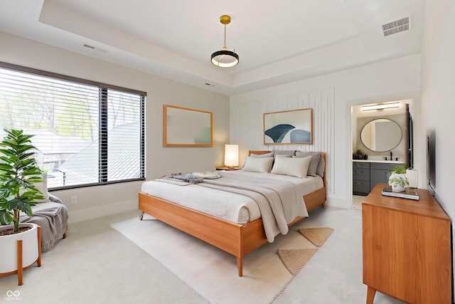 1333 Chatham Rdg Ct, Westfield, IN 46074 - bedroom featuring visible vents, a raised ceiling, baseboards, and light carpet