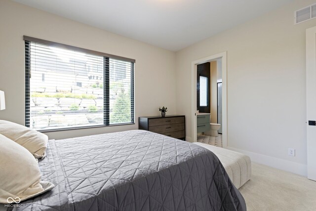 1333 Chatham Rdg Ct, Westfield, IN 46074 - carpeted bedroom with visible vents, multiple windows, and ensuite bath
