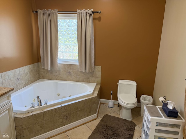 full bathroom with baseboards, a jetted tub, tile patterned flooring, and toilet