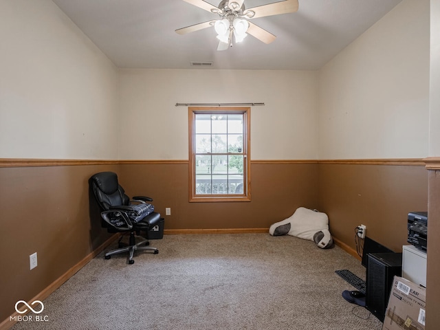 unfurnished room with carpet flooring, ceiling fan, and baseboards