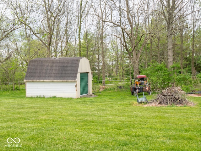 view of yard featuring a shed and an outdoor structure