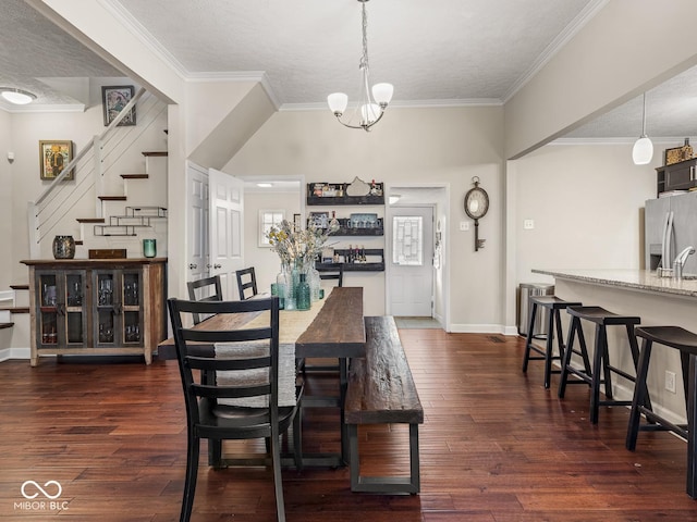 dining space with dark wood-style flooring, crown molding, stairway, baseboards, and a notable chandelier