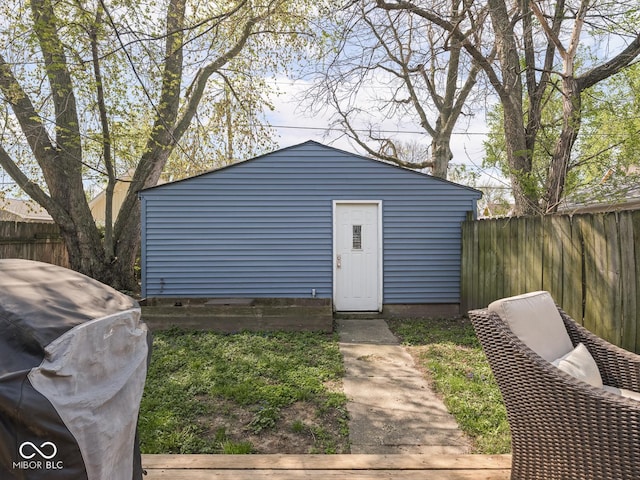 view of outdoor structure with an outdoor structure and fence