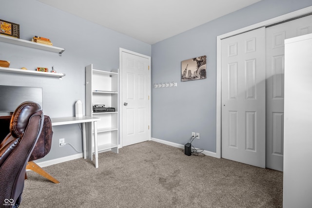office featuring baseboards and carpet