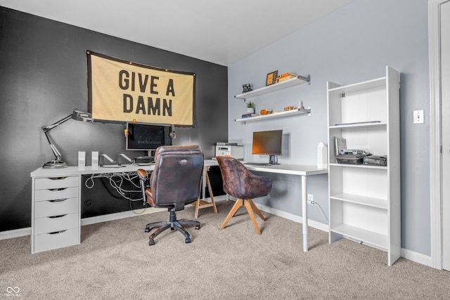 office space featuring baseboards and carpet