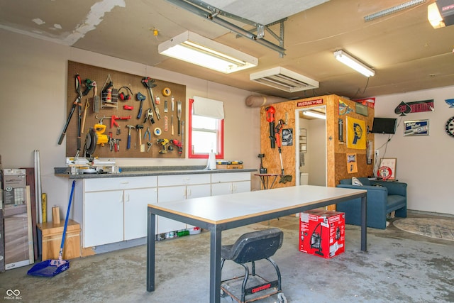 interior space featuring a workshop area