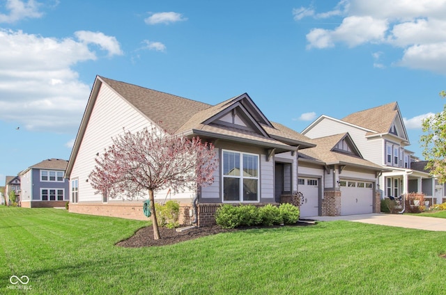 craftsman-style house with brick siding, an attached garage, a front lawn, and driveway