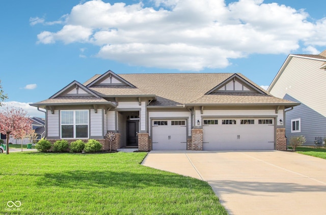 craftsman-style house with concrete driveway, brick siding, a front yard, and a garage