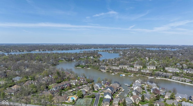 drone / aerial view with a water view and a residential view
