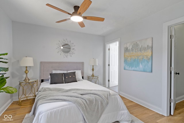 2005 Carrollton Ave, Indianapolis, IN 46202 - bedroom featuring light wood finished floors, baseboards, and ceiling fan