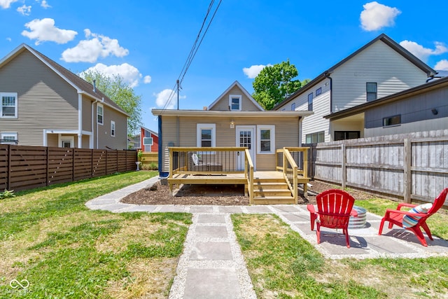 2005 Carrollton Ave, Indianapolis, IN 46202 - rear view of house with a deck and a patio area