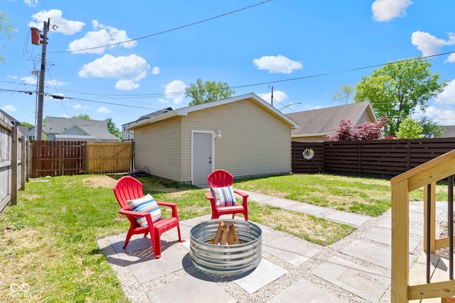 2005 Carrollton Ave, Indianapolis, IN 46202 - view of patio / terrace featuring a fire pit and an outdoor structure