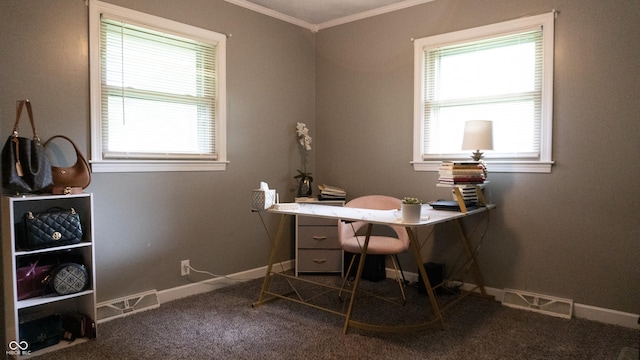 office area with plenty of natural light, ornamental molding, dark carpet, and visible vents