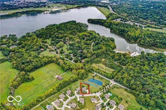 birds eye view of property featuring a water view