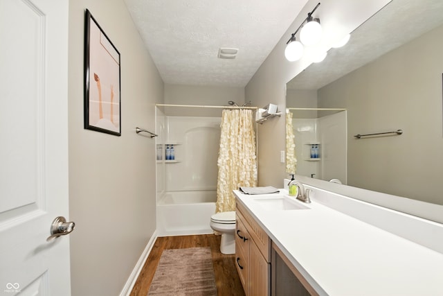 full bathroom featuring vanity, toilet, shower / bath combination with curtain, baseboards, and wood finished floors