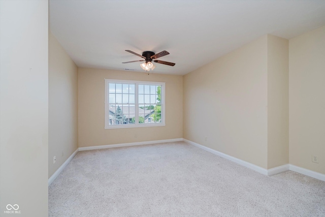 6345 Canak Dr, Avon, IN 46123 - spare room featuring a ceiling fan, light colored carpet, and baseboards