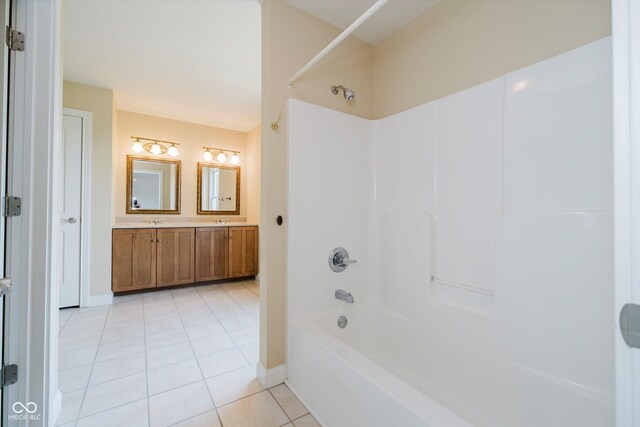 6345 Canak Dr, Avon, IN 46123 - full bathroom with tile patterned flooring, shower / bath combination, vanity, and baseboards