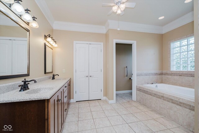6345 Canak Dr, Avon, IN 46123 - bathroom featuring double vanity, crown molding, tile patterned flooring, a garden tub, and a ceiling fan