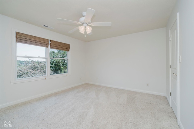 6345 Canak Dr, Avon, IN 46123 - spare room featuring baseboards, light carpet, and ceiling fan