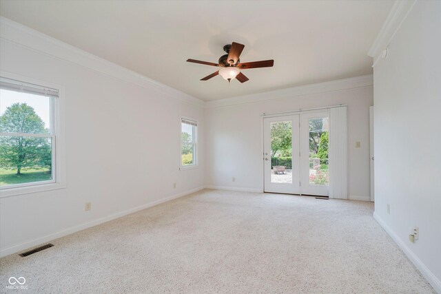 6345 Canak Dr, Avon, IN 46123 - empty room featuring ceiling fan, light colored carpet, crown molding, and baseboards