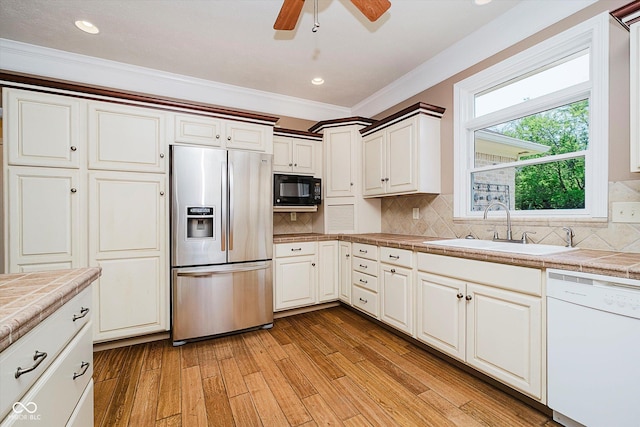 6345 Canak Dr, Avon, IN 46123 - kitchen featuring stainless steel fridge with ice dispenser, white dishwasher, black microwave, a sink, and crown molding