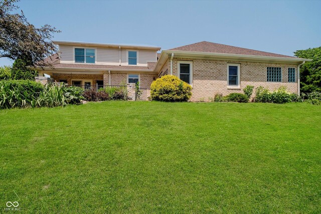 6345 Canak Dr, Avon, IN 46123 - back of house featuring a lawn and brick siding
