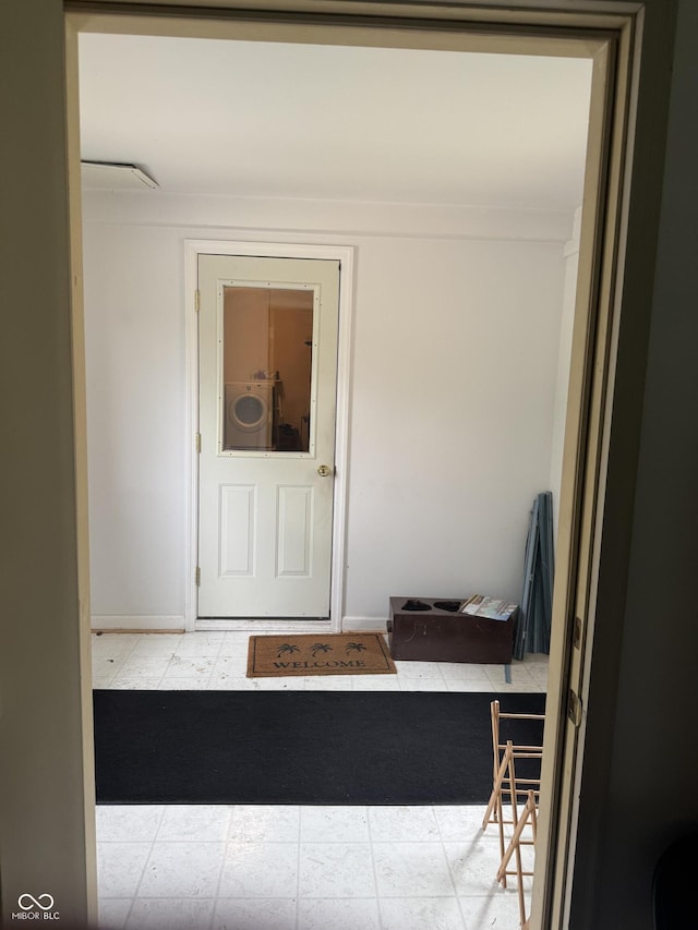 entrance to property with washer / dryer