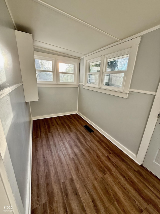 11 Highland St, Greencastle, IN 46135 - spare room with a healthy amount of sunlight, visible vents, dark wood finished floors, and baseboards