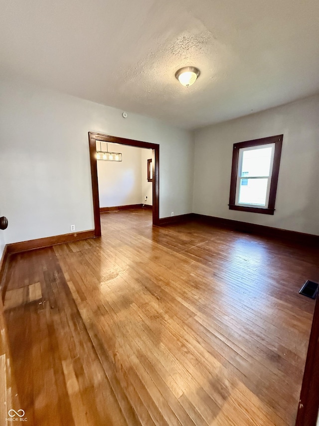 11 Highland St, Greencastle, IN 46135 - spare room with baseboards, visible vents, light wood-style floors, and a textured ceiling