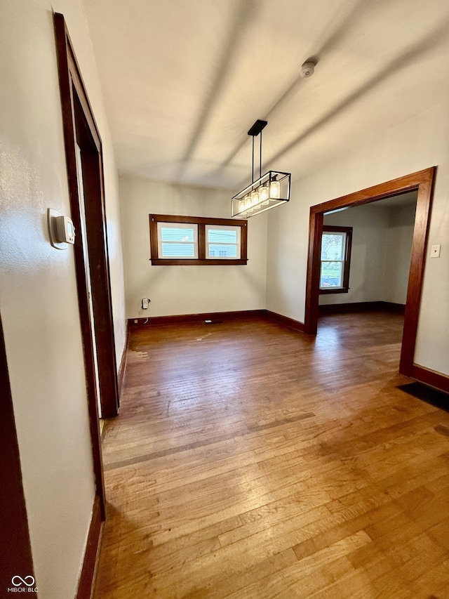 11 Highland St, Greencastle, IN 46135 - unfurnished dining area featuring baseboards and wood finished floors