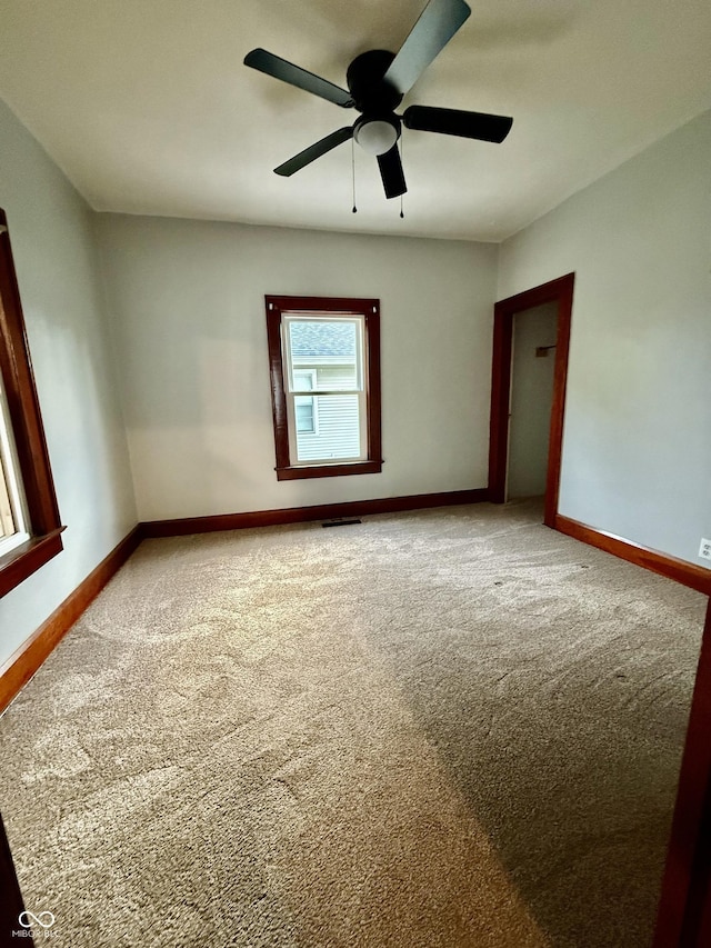 11 Highland St, Greencastle, IN 46135 - spare room with ceiling fan, carpet floors, and baseboards