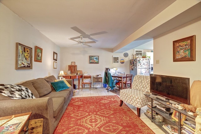 8899 E Southshore Dr, Unionville, IN 47468 - living room featuring a ceiling fan and light tile patterned floors