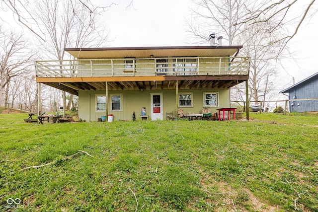 8899 E Southshore Dr, Unionville, IN 47468 - back of property featuring a lawn and a deck