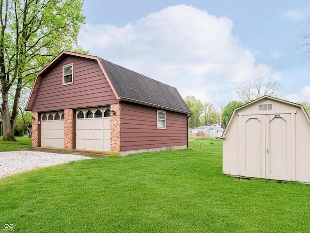 garage with a detached garage and a shed