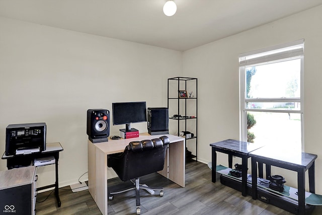 office with wood finished floors and baseboards