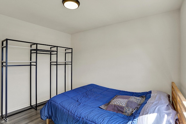 bedroom featuring wood finished floors