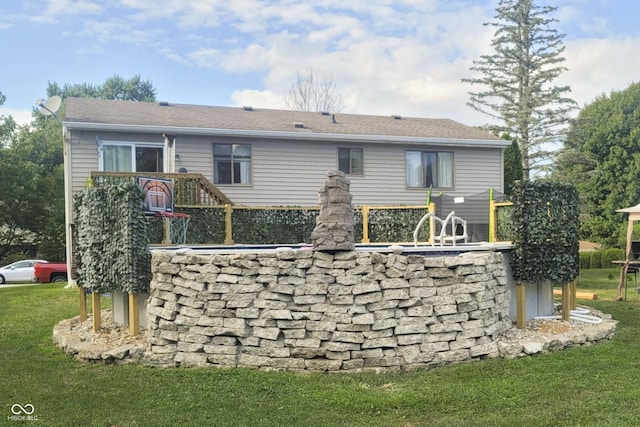 5335 Honey Comb Ln, Indianapolis, IN 46221 - back of house featuring a yard