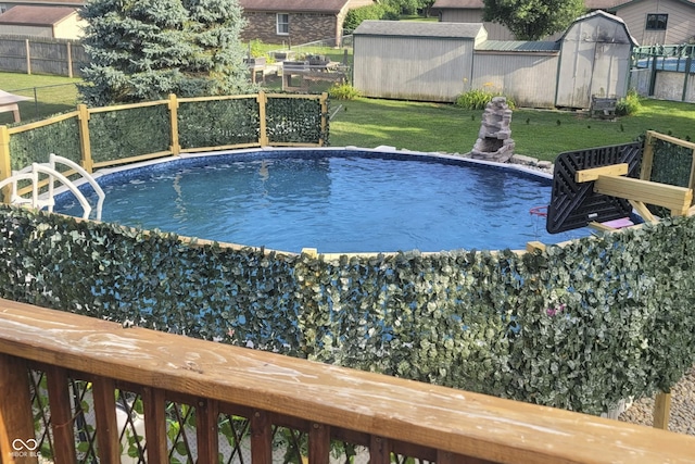 5335 Honey Comb Ln, Indianapolis, IN 46221 - view of pool with a storage shed and an outdoor structure