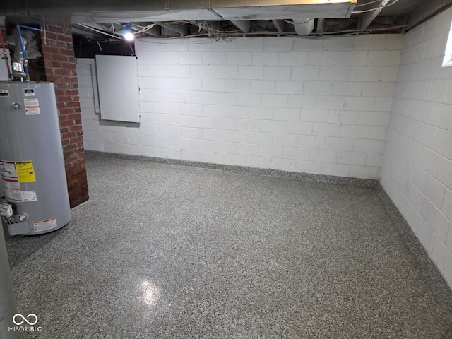 2819 W 16th St, Indianapolis, IN 46222 - unfinished basement featuring water heater and concrete block wall