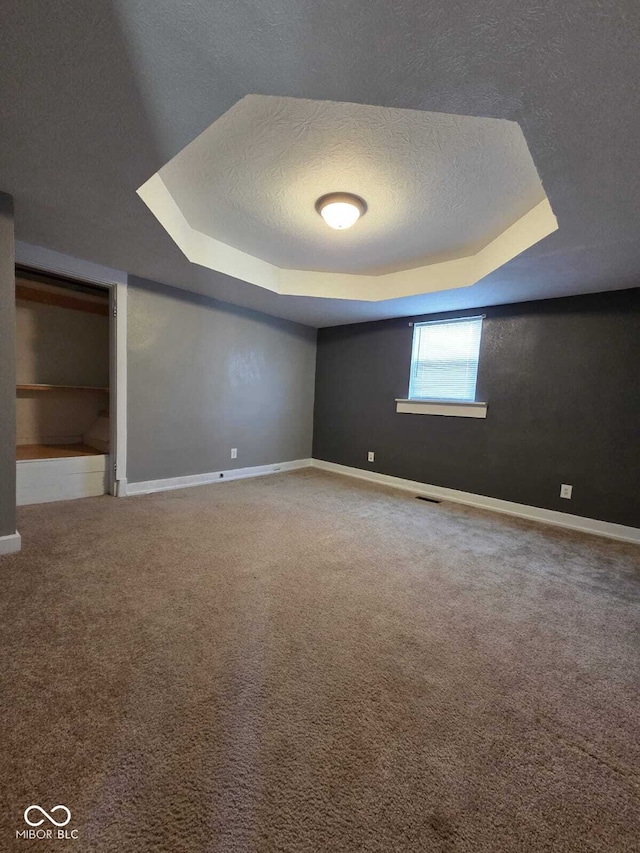 2819 W 16th St, Indianapolis, IN 46222 - interior space with a textured ceiling, baseboards, and carpet