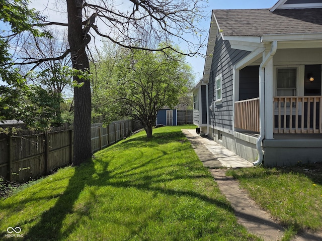2819 W 16th St, Indianapolis, IN 46222 - view of yard with fence, an outdoor structure, and a shed