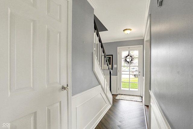 12669 Brookshire Pkwy, Carmel, IN 46033 - entryway featuring stairs, crown molding, and a wainscoted wall