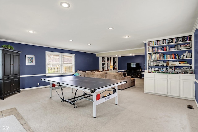 12669 Brookshire Pkwy, Carmel, IN 46033 - recreation room with crown molding, recessed lighting, visible vents, and light carpet