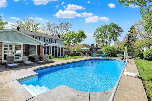 12669 Brookshire Pkwy, Carmel, IN 46033 - view of pool with a fenced backyard, a fenced in pool, a patio area, and a sunroom