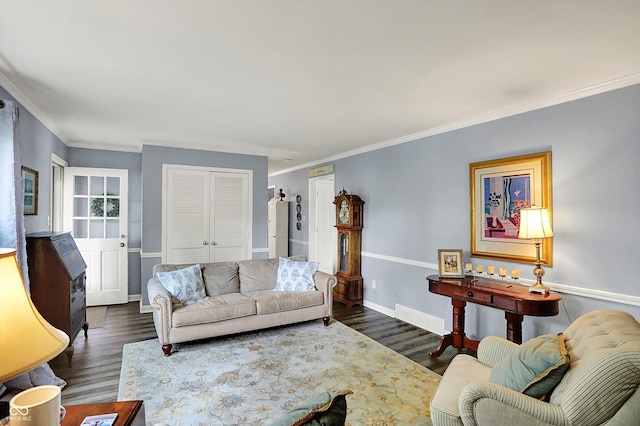 12669 Brookshire Pkwy, Carmel, IN 46033 - living room featuring crown molding, visible vents, and dark wood-style floors