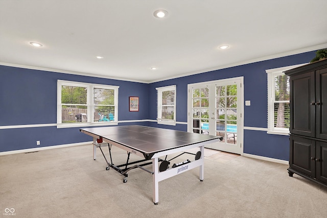 12669 Brookshire Pkwy, Carmel, IN 46033 - playroom with baseboards, light colored carpet, ornamental molding, and french doors
