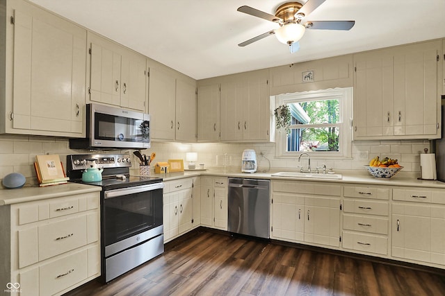 12669 Brookshire Pkwy, Carmel, IN 46033 - kitchen with a sink, appliances with stainless steel finishes, backsplash, and light countertops