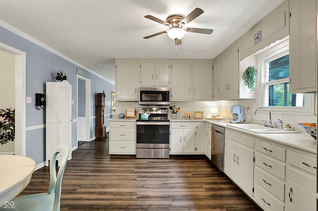 12669 Brookshire Pkwy, Carmel, IN 46033 - kitchen featuring ceiling fan, decorative backsplash, a sink, light countertops, and stainless steel appliances